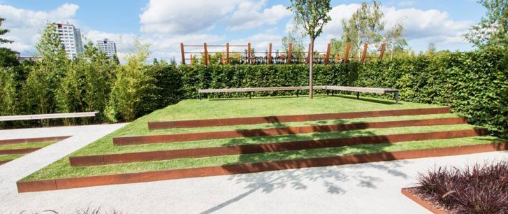 corten steel stair leading to tree